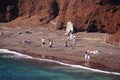 Tourists at the Red Beach in Santorini,Greece. Royalty Free Stock Photo