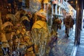 Tourists reflection in shop window during carnival in venice 2017 Royalty Free Stock Photo