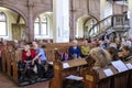 Tourists during rehearsal of the choir in the Thomaskirche St. Thomas Church in Leipzig, Germany. May 2014 Royalty Free Stock Photo