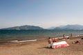 Tourists relax at the beach