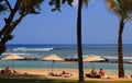 Tourists relax on the beach at Turtle Bay Mauritius