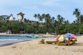 Tourists relax on the beach at Unawatuna on the south coast of Sri Lanka.