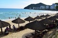 Tourists relax on Dadonghai beach, Sanya, Hainan in Sunny weather