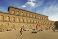 Tourists relax on the square in front of the Palazzo Pitti. Florence Royalty Free Stock Photo