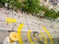 Tourists relax on the square in the WiFi access area