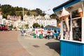 Tourists relaxing eating food, taking a leisurely stroll along Llandudno Pier Royalty Free Stock Photo