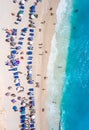 Tourists relaxing on the Egremni Beach in Lefkada swimming and p