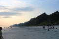 Tourists relaxing and enjoying the sunset at Radhanagar Beach, Havelock Island