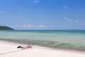 Tourists relaxing in the white beach