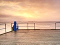 Tourists resort, pier above silent smooth water Royalty Free Stock Photo