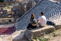 Tourists rest on the ruins of the ancient stadium of Myra in Demre, Turkey Royalty Free Stock Photo