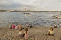 tourists resting on the banks of the river