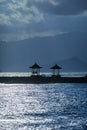 Tourists Resting in the Shelter of a Oceanside Pagoda