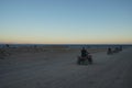 Tourists ride ATV through the picturesque places of Dahab, South Sinai Governorate, Egypt Royalty Free Stock Photo