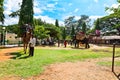 Tourists ride on an elephant and camel on a sunny day. Mysore. Karnataka. India.