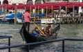 Tourists Ride Gondola in Grand Canal Royalty Free Stock Photo