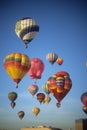 Tourists ride hot air balloons