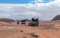 Tourists ride in open jeeps in the Wadi Rum desert Visitor near Aqaba city in Jordan