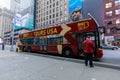 Tourists riding on Big Bus New York in Midtown Manhattan, NYC Royalty Free Stock Photo