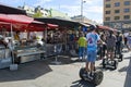 Tourists riding segways at the Fish Market in Bergen