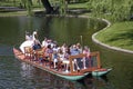 Tourists riding the Swan Boats Royalty Free Stock Photo