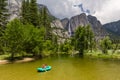 Tourists on river at Yosemite Falls