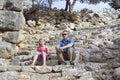 Tourists in the ruins of the ancient city of Lato