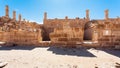 Tourists on Ruins of Great Temple Petra town Royalty Free Stock Photo