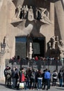 Tourists at Sagrada familia cathedral main entry