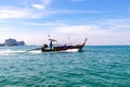 Tourists sailing in Longtail Boat in Andaman sea off the coast of Thailand