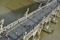 Tourists on the saint angelo bridge in rome