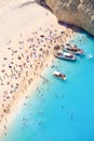 Tourists on the sand beach of Navagio Zakynthos