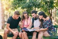 Tourists searching for direction using paper map Royalty Free Stock Photo