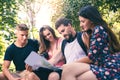 Tourists searching for direction using paper map Royalty Free Stock Photo