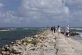 Tourists on seawall at South Inlet Park Boca Raton Florida