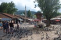 Tourists at the Sebilj square, Bascarsija old bazaar quarter wooden fountain Royalty Free Stock Photo