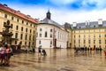 Tourists at the second courtyard of Prague Castle Prazsky hrad with Kohl Fountain Royalty Free Stock Photo