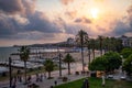 Tourists are seen in the city center and along the sea during the summer tourist season in the first year without significant