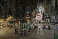 Tourists seen exploring and praying in the Hindu Temple, Batu Caves, Malaysia. Royalty Free Stock Photo