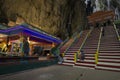 Tourists seen exploring and praying in the Hindu Temple, Batu Caves, Malaysia. Royalty Free Stock Photo