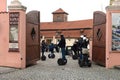 Tourists on Segways in the Museum of Kafka.