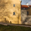 Tourists shadows on the wall