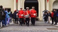 Tourists shoot the guard of honor ceremony at Prague Castle