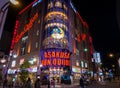 Tourists are shopping in Asakusa Don Quijote Tax free discount store. Royalty Free Stock Photo