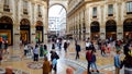 Tourists shopping in famous Milan city mall, Italian architecture, sightseeing Royalty Free Stock Photo
