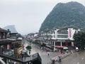 Tourists on shopping West Street in Yangshuo town