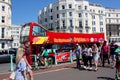 Tourists and sight seeing bus, Brighton, Sussex, England