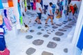 Charming cobbled commercial street of Chora Mykonos Cyclades Greece Royalty Free Stock Photo