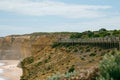 Tourists sightseeing on the lookout boardwalk at the 12 Apostles on the Great Ocean Road