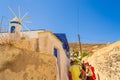 Tourists sightseeing at old abondened streets Santorini Greece